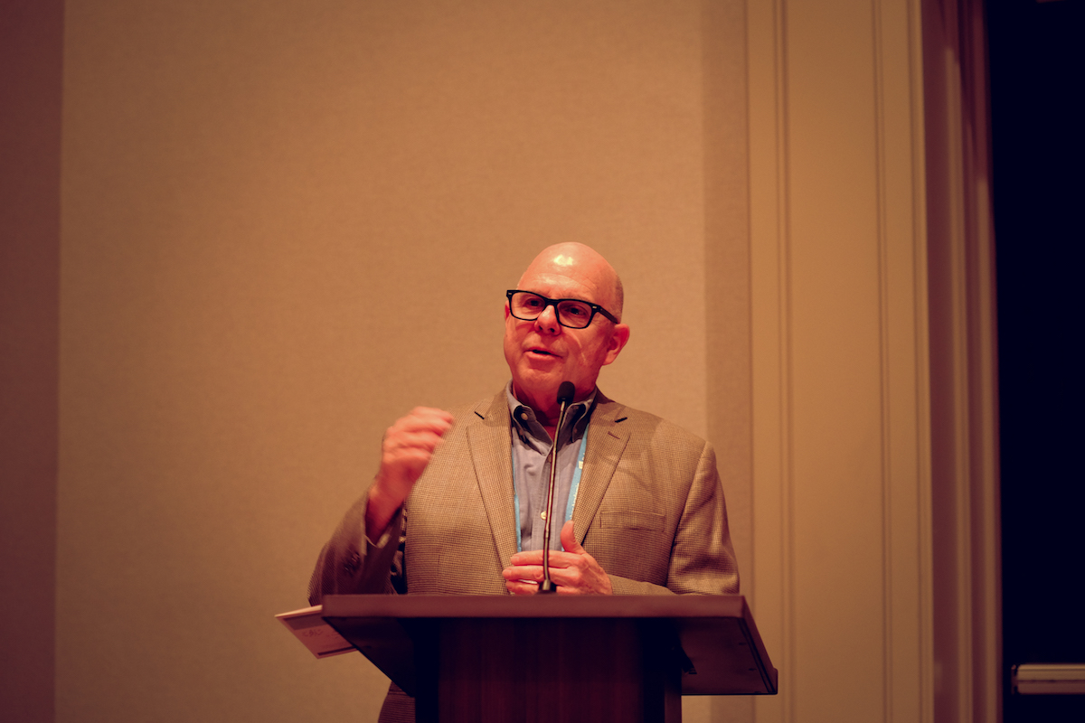 David Larsen addresses the Annual Meal